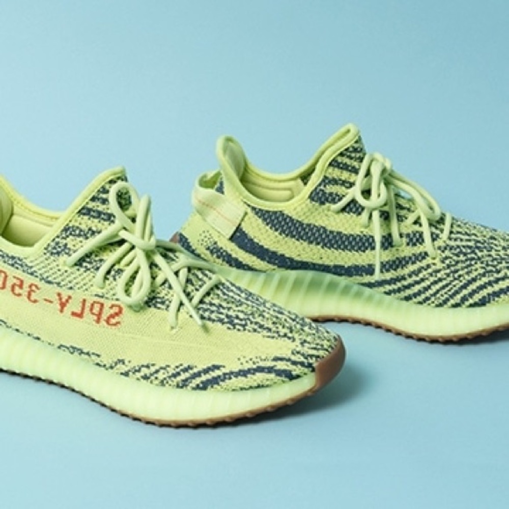 Yeezy Lime Green and Black Athletic Shoes